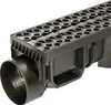 A close-up, studio shot of a black drainage channel with a hexagonal grate and a circular outlet pipe. Anteprima dell’immagine prodotto