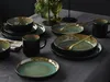 A table setting with plates, bowls, and mugs. Náhľad obrázku produktu