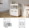 A white roll container with two drawers and an open shelf, shown in a kitchen and dining room setting, and also in isolation. Podgląd zdjęcia produktu