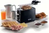 A breakfast spread featuring a toaster with toast, juice, croissants, jam, cheese, and ham. Produktbild-Vorschau