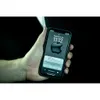 A hand holding an iPhone displaying a notification. Voir les images du produit