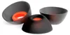 Three dark gray bowls with orange inserts, arranged on a white background. Náhled obrázku produktu