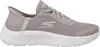 A side view of a beige Skechers slip-on shoe. Anteprima dell’immagine prodotto