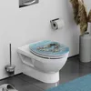 A toilet with a decorative seat in a bathroom setting. Náhled obrázku produktu