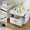 A white nightstand with drawers and shelves, featuring a wireless charging pad, a vase with flowers, and fruit on top. The image includes inset callouts highlighting features like raised edges, smooth metal slides, a convenient metal handle, and non-slip f Podgląd zdjęcia produktu