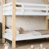 A close-up view of a white and natural wood bunk bed with bedding. Podgląd zdjęcia produktu