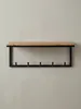 Frontansicht der Design Wandgarderobe aus Akazie und Metall auf weißem Hintergrund. Die klaren Linien und die fünf Haken sind gut erkennbar._#sku_SAFWL6.354# Produktbild-Vorschau