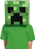 A child wearing a Minecraft Creeper mask and a green t-shirt. Anteprima dell’immagine prodotto