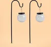 Two solar-powered hanging globe lights on black stands against a light orange background. Produktbild-Vorschau