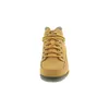 A front view of a single yellow Timberland boot against a white background. Voir les images du produit