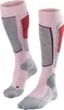 A pair of pink ski socks with gray and red accents. Produktbild-Vorschau