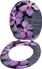 A toilet seat and lid with a floral and stone pattern. Náhľad obrázku produktu