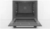 An open oven with the door down, showing the interior. Produktbild-Vorschau