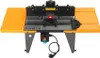 A woodworking router table with orange extension wings and a black main body, shown from the front. Anteprima dell’immagine prodotto