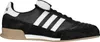 A studio shot of a single Adidas indoor soccer shoe. Anteprima dell’immagine prodotto
