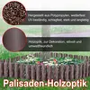 A garden border made of brown palisades surrounding flowers and a tree, with rain falling. Náhled obrázku produktu