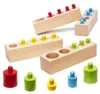A collection of Montessori wooden cylinder blocks with colored pegs. Anteprima dell’immagine prodotto