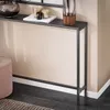 A console table with decorative items on top, next to a pink ottoman, in a room setting. Podgląd zdjęcia produktu