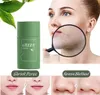 A woman's face is shown with a magnifying glass focusing on her pores, next to a green product stick labeled 'GREEN MASK'. Below are before and after images showing pore shrinking and blackhead removal. Náhled obrázku produktu