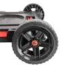 A close-up view of a black all-terrain wheel with red accents on a black platform. Produktbild-Vorschau
