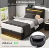 A bedroom scene featuring a bed with LED lighting and a close-up of a USB charging port. Náhľad obrázku produktu