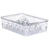 A clear, studio shot of a transparent plastic egg container with a lid. Náhľad obrázku produktu