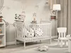 A nursery room with a crib, toys, and decor. Náhľad obrázku produktu