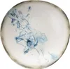 A single plate with a blue abstract design on a white background. Produktbild-Vorschau