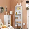 A white bookshelf with various decorative items and books displayed on its shelves, set against a peachy-pink wall. Náhled obrázku produktu