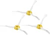 Three white and yellow side brushes for a robot vacuum cleaner are arranged on a white background. Voir les images du produit