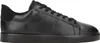 A side view of a black leather sneaker. Voir les images du produit