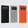 Three smartphone cases in different colors arranged side-by-side against a light gray background. Produktbild-Vorschau
