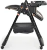 A black high chair with rose gold accents is shown from the side against a white background. Produktbild-Vorschau
