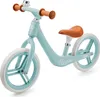 A light blue balance bike with brown handlebars and seat, shown against a white background. Anteprima dell’immagine prodotto