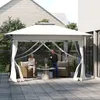 A couple relaxing under a white gazebo in a backyard patio. Náhled obrázku produktu