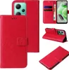 A collage of images showing a red flip phone case with floral and butterfly embossing, displaying its features and how it can be used. Produktbild-Vorschau