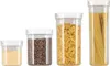 Four clear plastic food storage containers of varying sizes are displayed against a white background. The containers hold different food items: sugar, coffee beans, cereal, and spaghetti. Anteprima dell’immagine prodotto