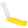 A white plastic bottle attached to a yellow plastic trough, likely a portable pet water dispenser. Produktbild-Vorschau