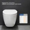 A white wall-mounted toilet is shown next to a marketing graphic comparing its color to other toilets. Produktbild-Vorschau