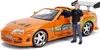A toy model of an orange Toyota Supra with a figurine of a man standing next to it. Anteprima dell’immagine prodotto