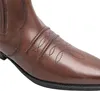 A close-up view of the toe of a brown leather western boot. Náhled obrázku produktu