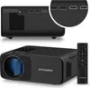 A black Overmax projector and its remote control are displayed against a white background. The projector is shown from a low angle, highlighting its lens and branding. A close-up inset shows the various ports on the back of the projector. Voir les images du produit
