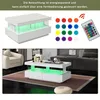 A collage of a white coffee table with LED lighting and a living room scene. Voir les images du produit