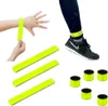 A collage of reflective bands being worn on a wrist and ankle, and also shown laid out and as small rolls. Produktbild-Vorschau