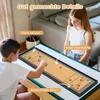 Two children are playing a tabletop shuffleboard and curling game in a living room. Produktbild-Vorschau