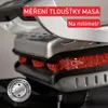 A close-up of a grill with meat cooking on it, featuring marketing text and a sensor icon. Produktbild-Vorschau
