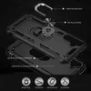 An exploded view of a black smartphone case, showing its layered construction and integrated features like a ring stand. Produktbild-Vorschau