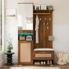 A well-lit interior shot of a hallway furniture set, featuring a coat rack, bench, and storage. Produktbild-Vorschau
