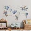 A nursery or child's room with wall stickers of teddy bears and balloons. Anteprima dell’immagine prodotto