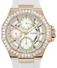 A close-up studio shot of a women's Guess watch with a white band and rose gold case, featuring a multi-dial face adorned with crystals. Náhľad obrázku produktu